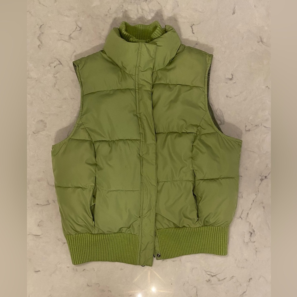 this is a XL green puffer vest, the brand is merona, it is brand new never worn